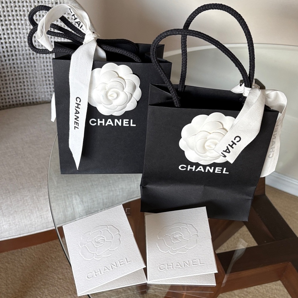 Chanel Black Mini Bag with White Floral Detail